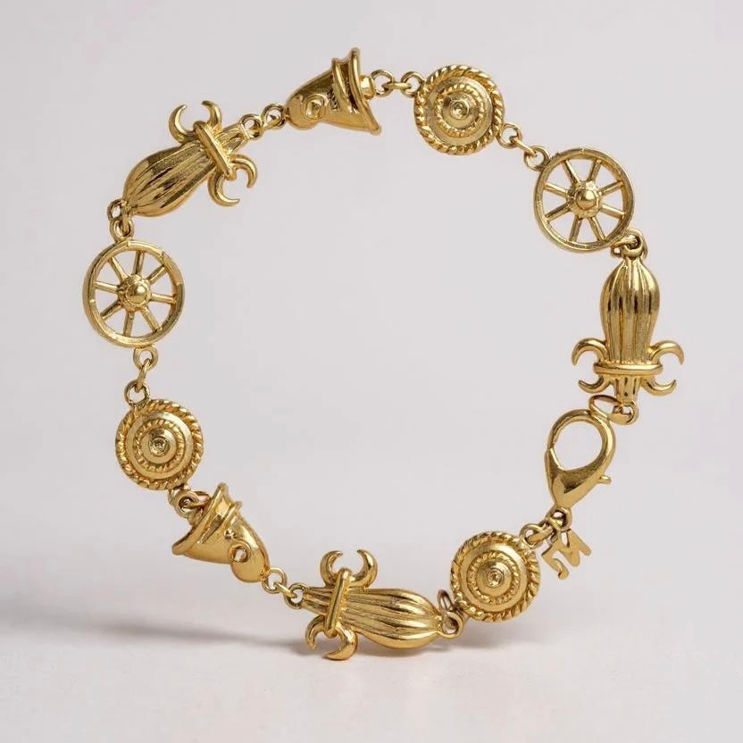 GOLDEN EPOCH CHARM BRACELET BY NINA RICCI