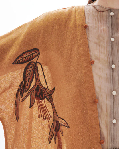 MONOCHROME BIRD OF PARADISE ON RUST ABAYA