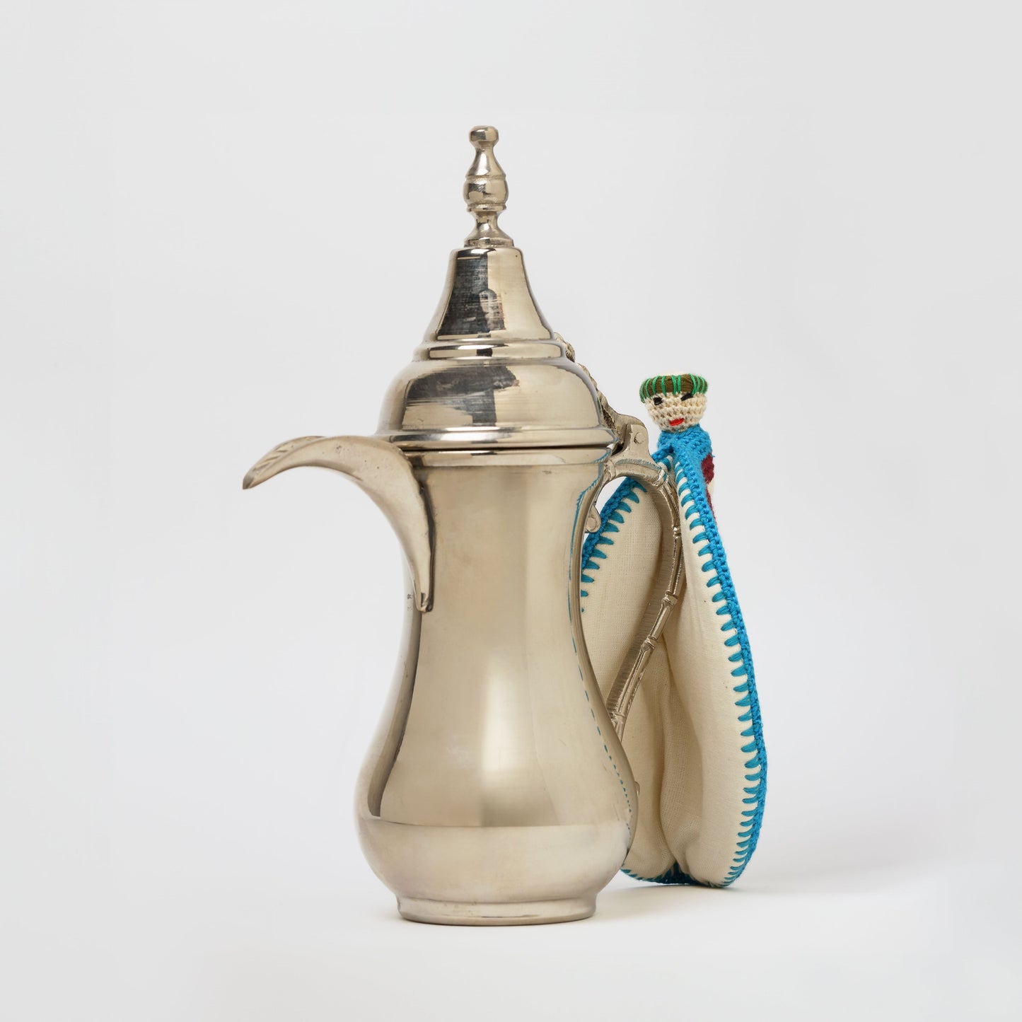 EL FALAHIN TEAPOT HOLDER