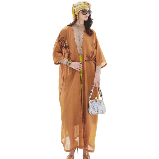 MONOCHROME BIRD OF PARADISE ON RUST ABAYA