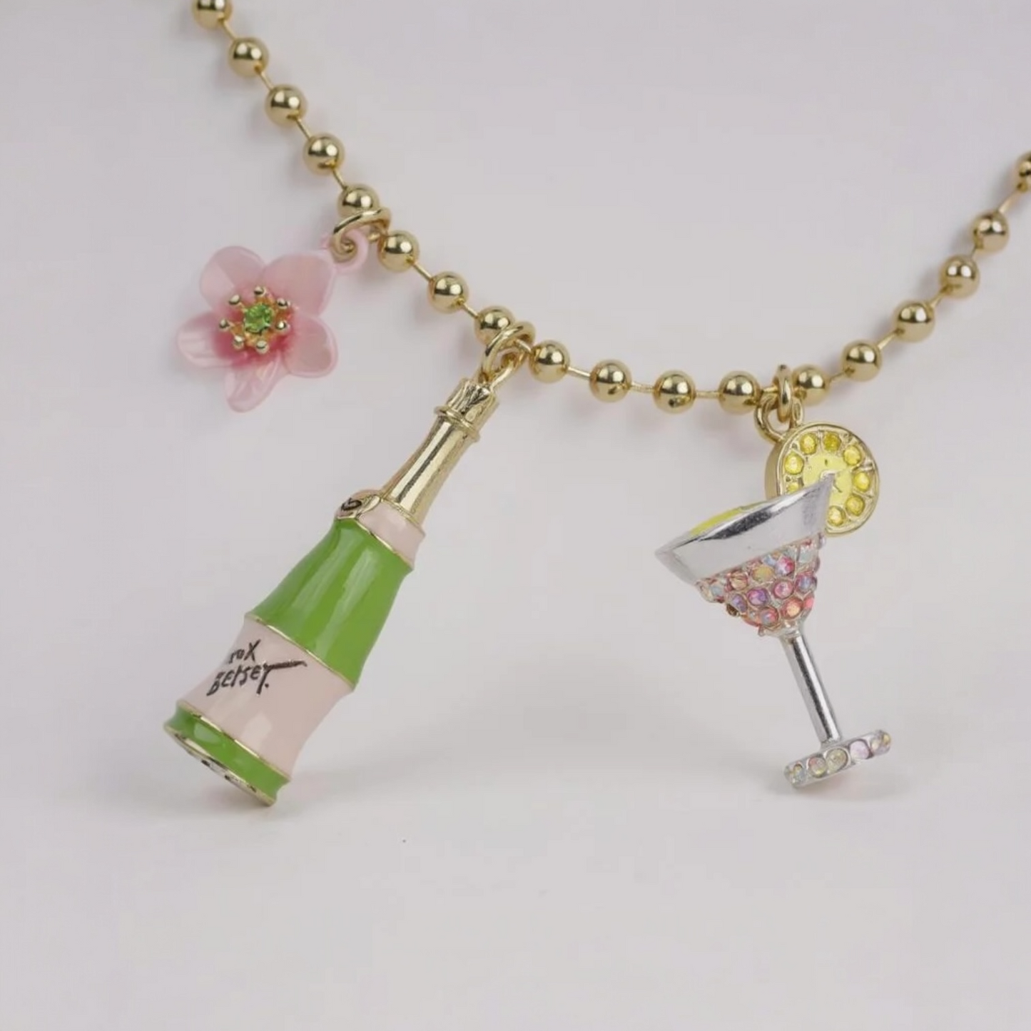 BETSEY JOHNSON CHAMPAGNE TOAST CHARM NECKLACE